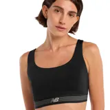 Top deportivo New Balance de color negro con cuello redondo y banda elástica inferior con logo de la marca y detalles de líneas horizontales.