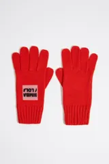 Guantes de punto color gris con etiqueta de silicona con el logo de la marca Bimba y Lola.