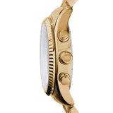 Reloj Michael Kors modelo Lexington, color dorado, con caja de acero inoxidable de 38mm, esfera dorada con números romanos, cronógrafo, cristal mineral resistente y pulsera de eslabones con cierre desplegable. Resistente al agua hasta 100 metros.