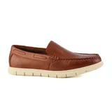 Zapato casual de cuero marrón con cordones y suela de goma color crema.