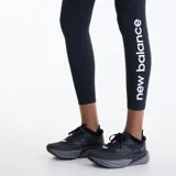 Calza deportiva de tiro alto color negro, con diseño ajustado y largo de 25 pulgadas, ideal para entrenamientos y running.