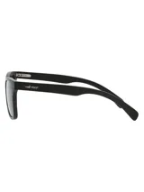 Lentes de sol con marco de madera de nogal natural y cristales polarizados con protección UV.