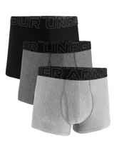 Pack de tres bóxers Under Armour Performance Tech Solid, confeccionados con tejido transpirable, en colores negro, gris oscuro y gris claro. Cuentan con cintura elástica ancha con el logotipo de la marca.