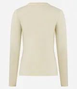 Blusa de manga larga con cuello redondo, confeccionada en una mezcla de algodón y elastano. Presenta un diseño básico, ajustado y liso, ideal para uso diario.