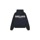 Hoodie oversize azul marino de Eme Studios, con capucha y estampado en la espalda con el texto 'EMESTUDIOS EXCLUSIVE PIECES SELECTED WITH CARE / MADRID ALWAYS GRATEFUL'.
