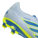 Championes de fútbol Adidas Predator Club Fg/Mg, color celeste con detalles en azul y amarillo neón. Presentan el diseño icónico de la línea Predator con las tres tiras laterales y suela multitaco para césped natural y artificial.
