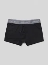 Boxer negro de algodón con cintura elástica gris que presenta la inscripción de la marca Uniform.
