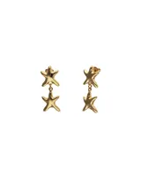 Aros colgantes bañados en oro 18k con diseño de doble estrella de mar articulada.