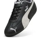 Championes Puma Speedcat LTHR negros con detalles en blanco, de caña baja y suela plana.