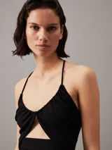 Vestido midi negro de punto canalé crepé con tirantes finos, espalda cruzada con detalle metálico y recorte en la parte delantera de la cintura.