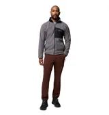Campera de polar Columbia con cierre frontal completo, cuello alto y bolsillo en el pecho con cierre y panel de contraste. Presenta ribetes elásticos en puños y dobladillo.