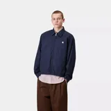 Chaqueta Carhartt WIP modelo Duke, color azul marino, con cuello clásico, cierre frontal con cremallera y logo bordado en el pecho.