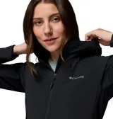 Campera softshell híbrida Columbia, modelo Trailborne, color negro, con capucha, cierre frontal y bolsillos con cremallera. Incorpora tecnología Omni-Shield de repelencia al agua y a las manchas.
