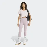 Calza deportiva Adidas de tiro alto, confeccionada en tejido suave y flexible con tecnología AEROREADY que absorbe la humedad. Presenta un ajuste ceñido y costuras contorneadas para mayor comodidad durante el entrenamiento.