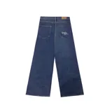 Pantalón de jean estilo baggy, de corte ultra holgado y tiro medio, confeccionado en denim de color azul oscuro con acabado raw.