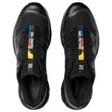 Championes Salomon modelo XT-6, color negro, con diseño técnico de alto rendimiento. Presenta una construcción ligera y duradera con malla y lámina de TPU, sistema de cordones rápidos y entresuela con amortiguación EVA para mayor estabilidad.