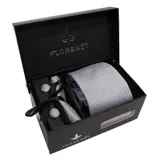 Set de corbata, pañuelo de bolsillo y gemelos color azul petróleo con diseño geométrico. Gemelos plateados con detalle de piedra redonda en el centro.