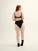 Culotte de lycra color blanco, de corte alto a la cintura.