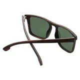 Lentes de sol Indie Growler, con marco de madera color ébano y lentes verdes.