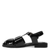 Sandalias tipo franciscana de mujer, confeccionadas en material sintético con acabado charolado color negro. Presentan un diseño de tiras entrelazadas, puntera cerrada y cierre mediante hebilla metálica lateral.