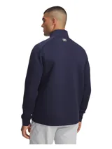 Buzo de golf Under Armour para hombre con media cremallera y cuello alto. Diseño híbrido con aislamiento en el pecho y cuello, y tejido transpirable en mangas y cuerpo. Cuenta con el logotipo de la marca en una placa metálica en el pecho.