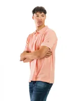 Chomba manga corta color borgoña con cuello clásico y borde azul marino.