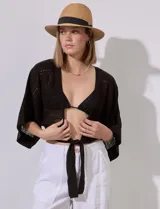 Bolero calado negro de poliéster con mangas 3/4 y frente abierto con lazo.