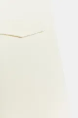 Pantalón de tiro medio y corte ancho, confeccionado en hilatura de algodón, con cintura elástica.