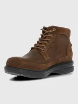 Bota de cuero estilo botín con cordones, diseño de punta cuadrada y suela de goma con tecnología de absorción de impactos.