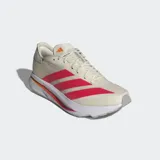 Championes de running Adidas Adizero SL 2, color crema con tres franjas laterales en color fucsia. La mediasuela es blanca con detalles en naranja y lleva la inscripción "LIGHTSTRIKE PRO".