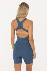 Catsuit azul de lycra con espalda descubierta y corte biker.