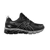 Championes de running Asics Gel-Quantum 180, color negro con detalles en gris. Presentan tecnología de amortiguación GEL en la entresuela, diseño de malla transpirable y refuerzos sintéticos en la estructura.