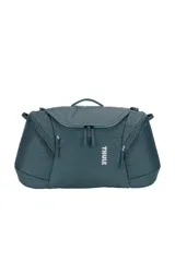 Bolso de viaje Thule RoundTrip de 90 litros, color azul oscuro, con diseño ergonómico y compartimentos organizadores. Fabricado en nylon resistente con protección acolchada para el equipo.