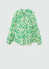 Blusa de tejido semitransparente con estampado floral en tonos verdes sobre fondo claro. Presenta escote en pico, cierre frontal con botones y mangas largas abullonadas con puños abotonados.