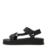 Sandalias Miss Carol modelo Jeli, color negro, con diseño estilo Teva, plataforma plana y tiras ajustables de goma.