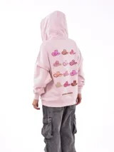 Buzo con capucha (hoodie) color gris melange, de corte holgado, con bolsillo canguro frontal y cordones ajustables en el cuello.