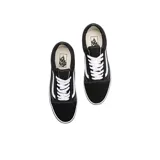 Championes Vans modelo Old Skool, de diseño clásico con capellada de gamuza y lona en color negro, con la icónica banda lateral blanca y suela de goma vulcanizada.