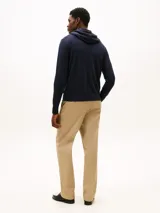 Buzo de punto fino color azul marino con capucha y cordón ajustable, manga larga y logo bordado en el pecho, de Tommy Hilfiger.