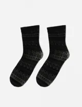 Medias largas de tejido calado con diseño de encaje en color negro.