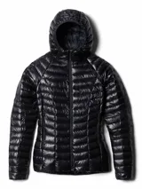 Campera puffer ultraligera de Mountain Hardwear, color negro, con capucha integrada, cierre frontal completo y bolsillos laterales con cierre. Diseño altamente compactable y resistente al agua.