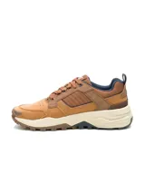 Sneaker Caterpillar modelo Grapple Leather para hombre, fabricado en cuero marrón con detalles en tonos tostados y azul oscuro, con suela dentada y entresuela de EVA.