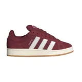Championes adidas modelo Campus 00s, color bordó con las icónicas tres tiras laterales en blanco. Presentan una silueta clásica de perfil bajo, confeccionados en gamuza con suela de goma en tono crema.