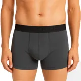 Pack de tres bóxers para hombre de la marca Quiksilver, en colores negro, índigo y gris, con cintura elástica con el logo de la marca en relieve.