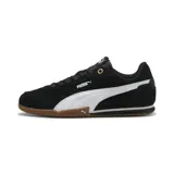 Championes Puma Bella Donna SD color negro con franja lateral blanca y suela de goma color caramelo.