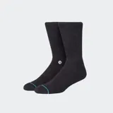 Medias de caña media color negro, con tejido acanalado en la parte superior y detalle de línea turquesa en la puntera. Incluye logo de la marca bordado en el lateral.