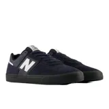 Championes New Balance Numeric 306 color azul marino con la característica 'N' en color blanco en los laterales. Posee refuerzos de gamuza, paneles de malla y suela de goma negra.
