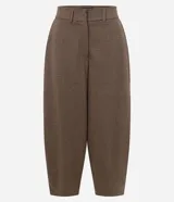 Pantalón de corte barrel con estampado de cuadros, tiro alto, bolsillos laterales y trabillas para cinturón. Confeccionado en tejido con estructura y caída fluida.