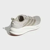 Championes de running Adidas Supernova Ease 2, color beige con las icónicas tres tiras en tono metálico y suela blanca con tecnología Dreamstrike.