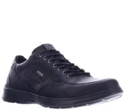 Zapatos casuales de hombre Freeway, color negro, confeccionados en cuero con detalles perforados en los laterales y cierre mediante cordones.