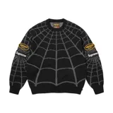 Sweater de tejido de punto en color negro con diseño de telaraña en gris. Presenta parches bordados con el logo de Vanson Leathers y el logo de Supreme en ambas mangas.
